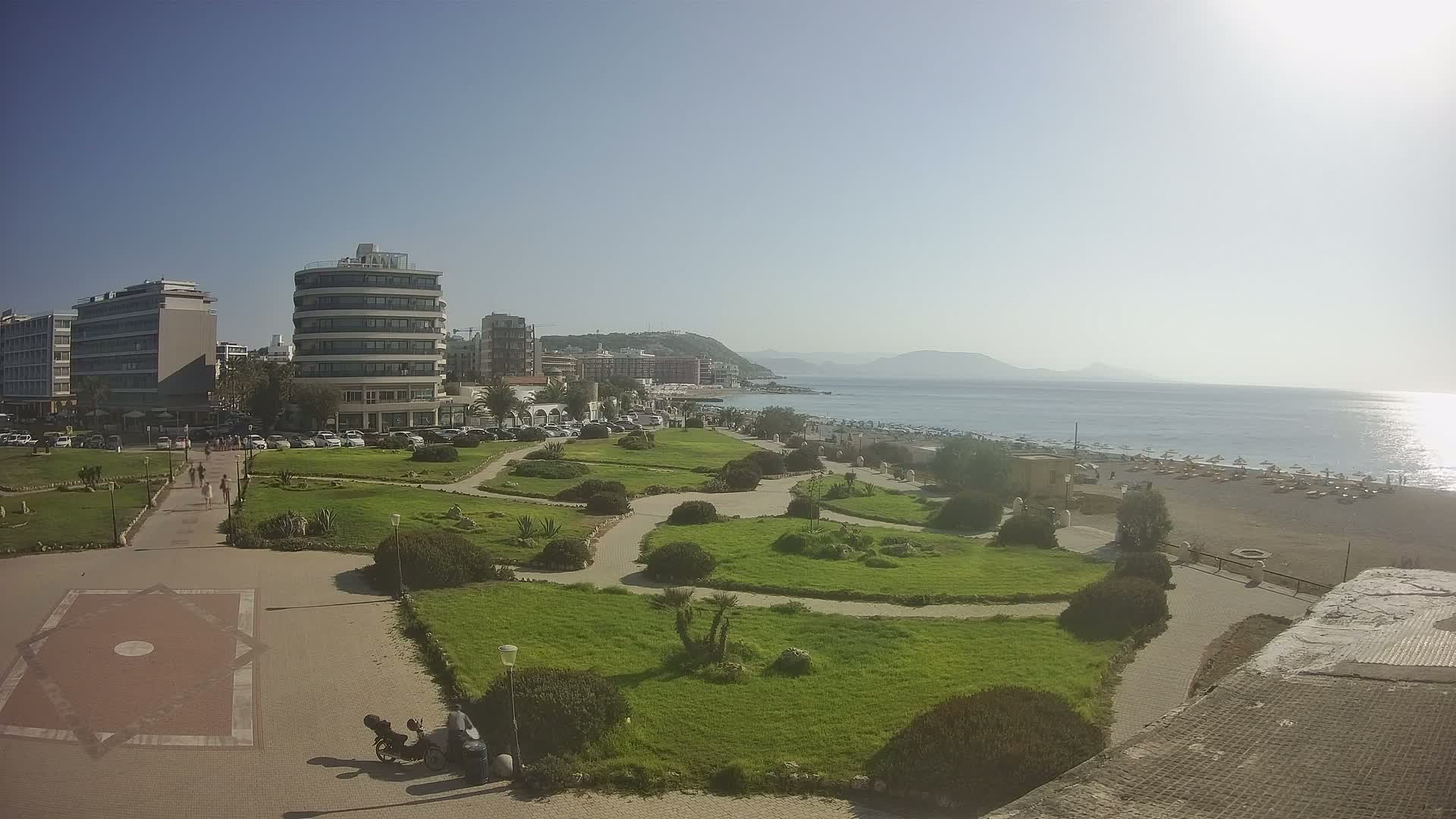Rhodes, Paralia Elli Beach & Platia Enidriou Plaza Live Cam - Elli Beach, Rhodes (Ródos), Dodacanese, South Aegean (Periféreia Notíou Aigaíou), Greece
