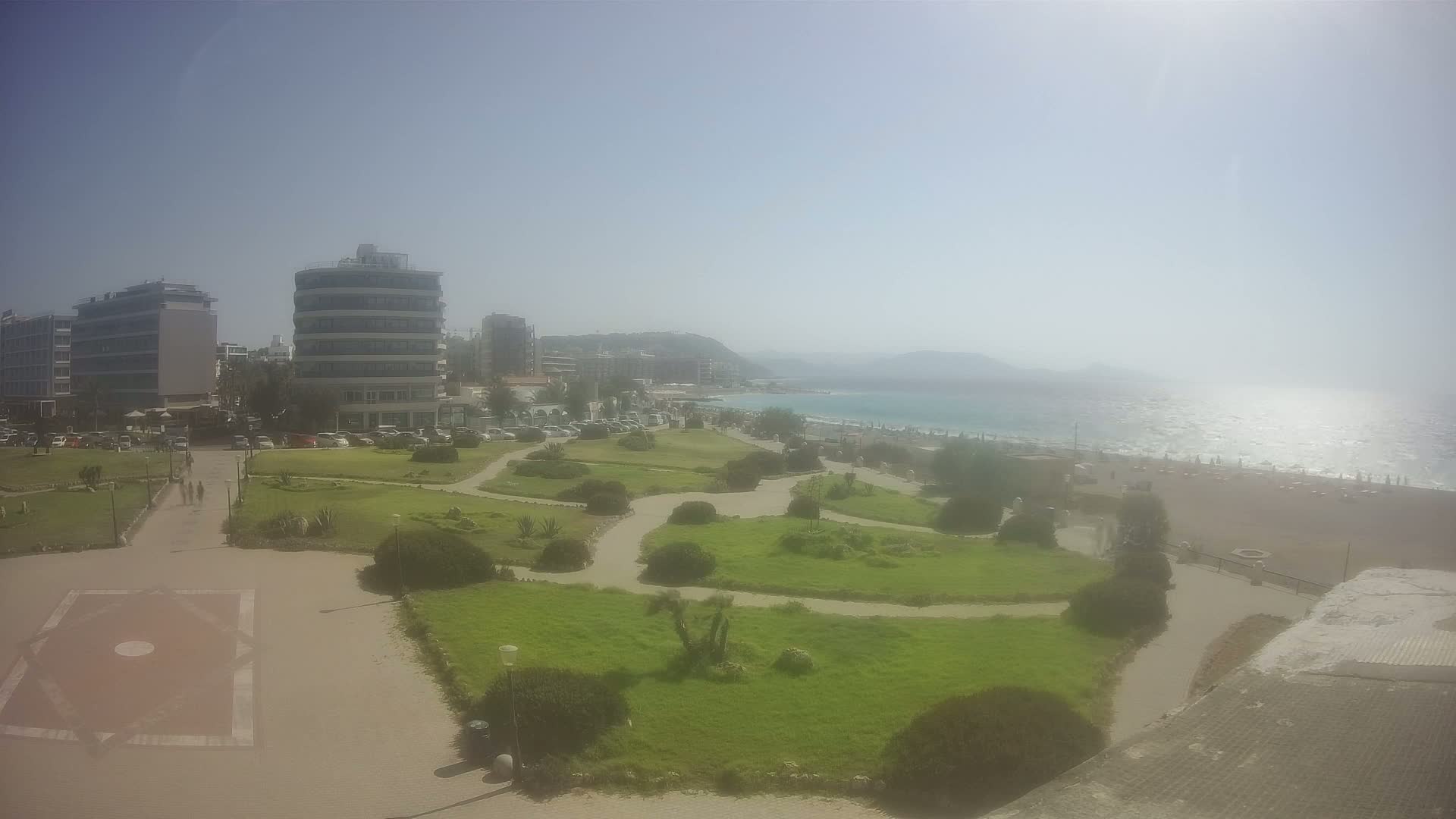 Rhodes, Paralia Elli Beach & Platia Enidriou Plaza Live Cam - Elli Beach, Rhodes (Ródos), Dodacanese, South Aegean (Periféreia Notíou Aigaíou), Greece