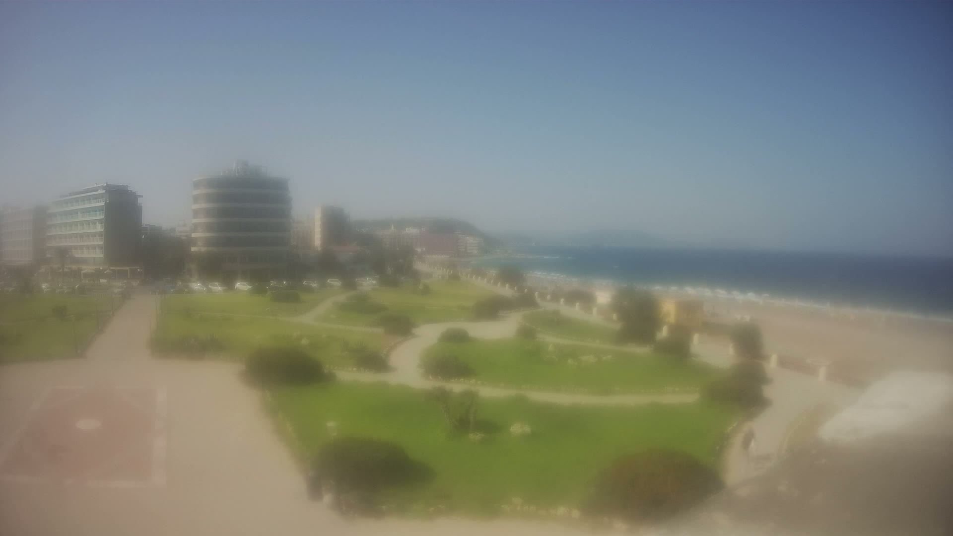 Rhodes, Paralia Elli Beach & Platia Enidriou Plaza Live Cam - Elli Beach, Rhodes (Ródos), Dodacanese, South Aegean (Periféreia Notíou Aigaíou), Greece