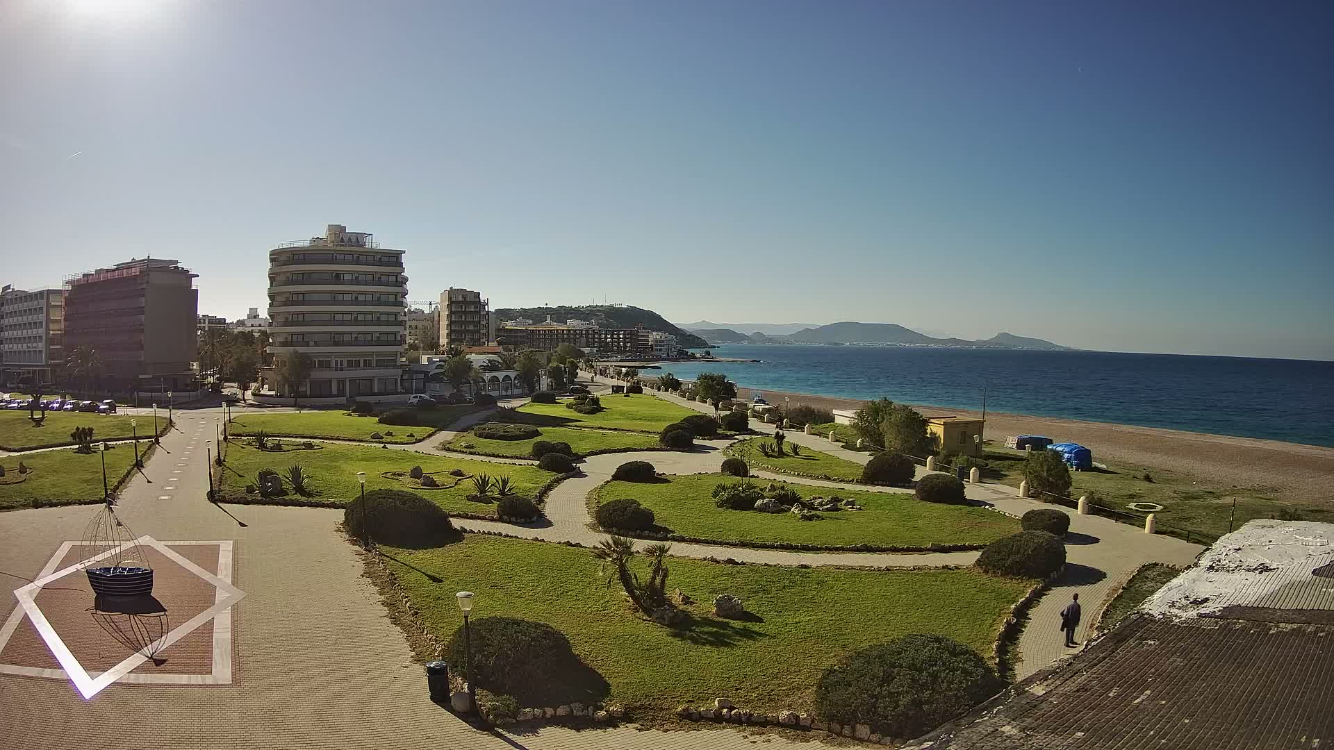 Rhodes, Paralia Elli Beach & Platia Enidriou Plaza Live Cam - Elli Beach, Rhodes (Ródos), Dodacanese, South Aegean (Periféreia Notíou Aigaíou), Greece