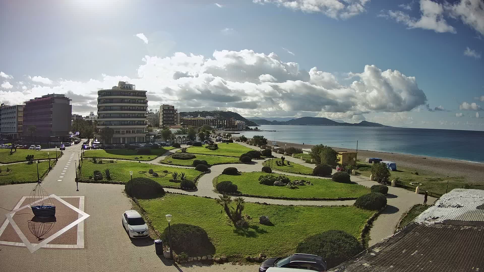 Rhodes, Paralia Elli Beach & Platia Enidriou Plaza Live Cam - Elli Beach, Rhodes (Ródos), Dodacanese, South Aegean (Periféreia Notíou Aigaíou), Greece