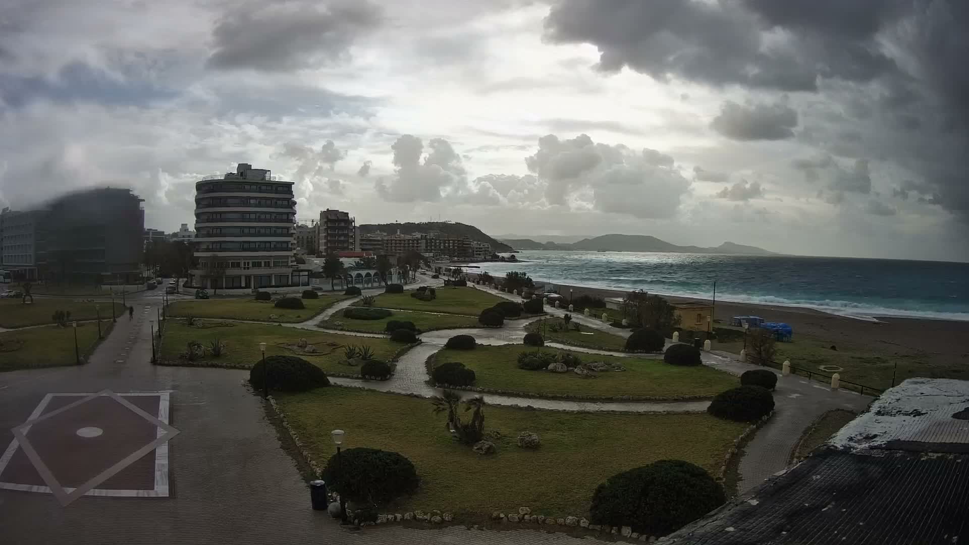 Rhodes, Paralia Elli Beach & Platia Enidriou Plaza Live Cam - Elli Beach, Rhodes (Ródos), Dodacanese, South Aegean (Periféreia Notíou Aigaíou), Greece