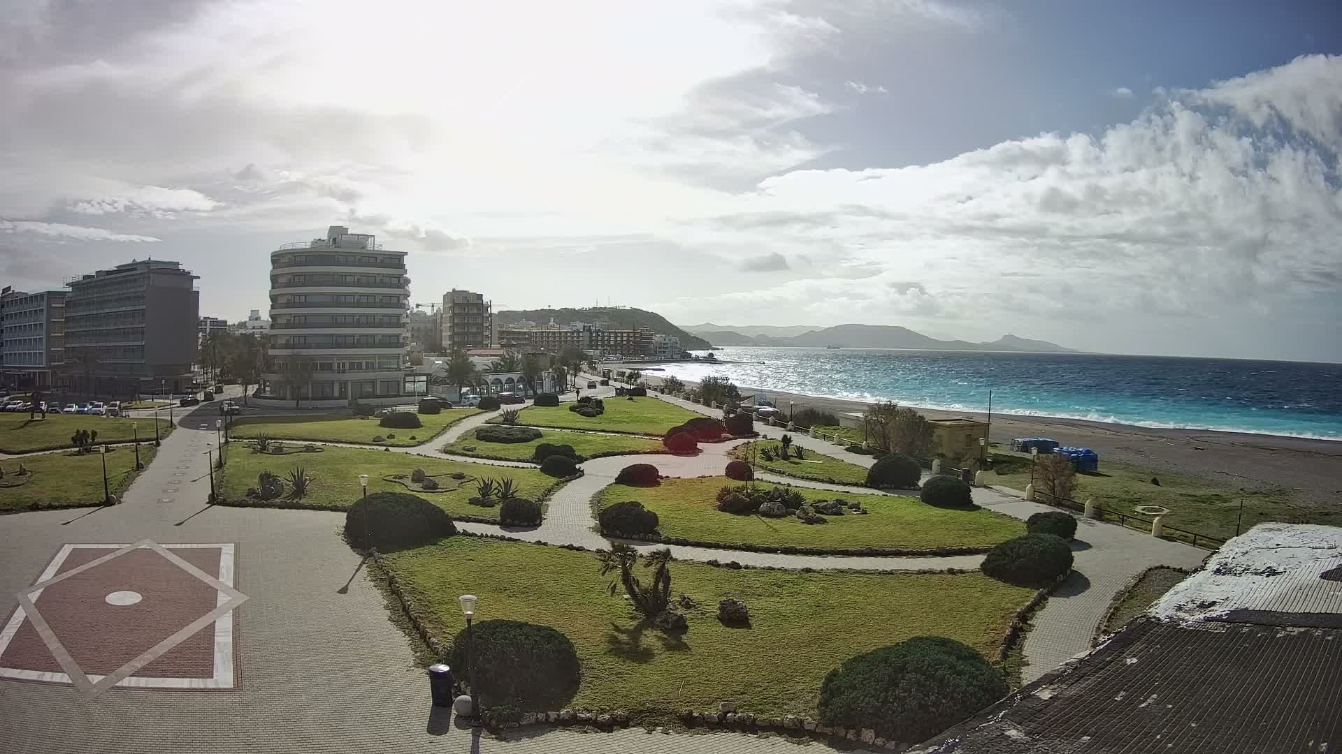 Rhodes, Paralia Elli Beach & Platia Enidriou Plaza Live Cam - Elli Beach, Rhodes (Ródos), Dodacanese, South Aegean (Periféreia Notíou Aigaíou), Greece