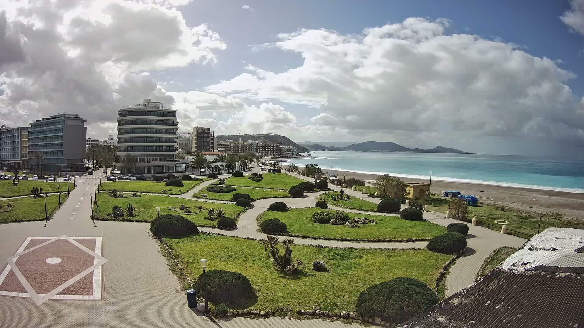 Rhodes, Paralia Elli Beach & Platia Enidriou Plaza Live Cam - Elli Beach, Rhodes (Ródos), Dodacanese, South Aegean (Periféreia Notíou Aigaíou), Greece