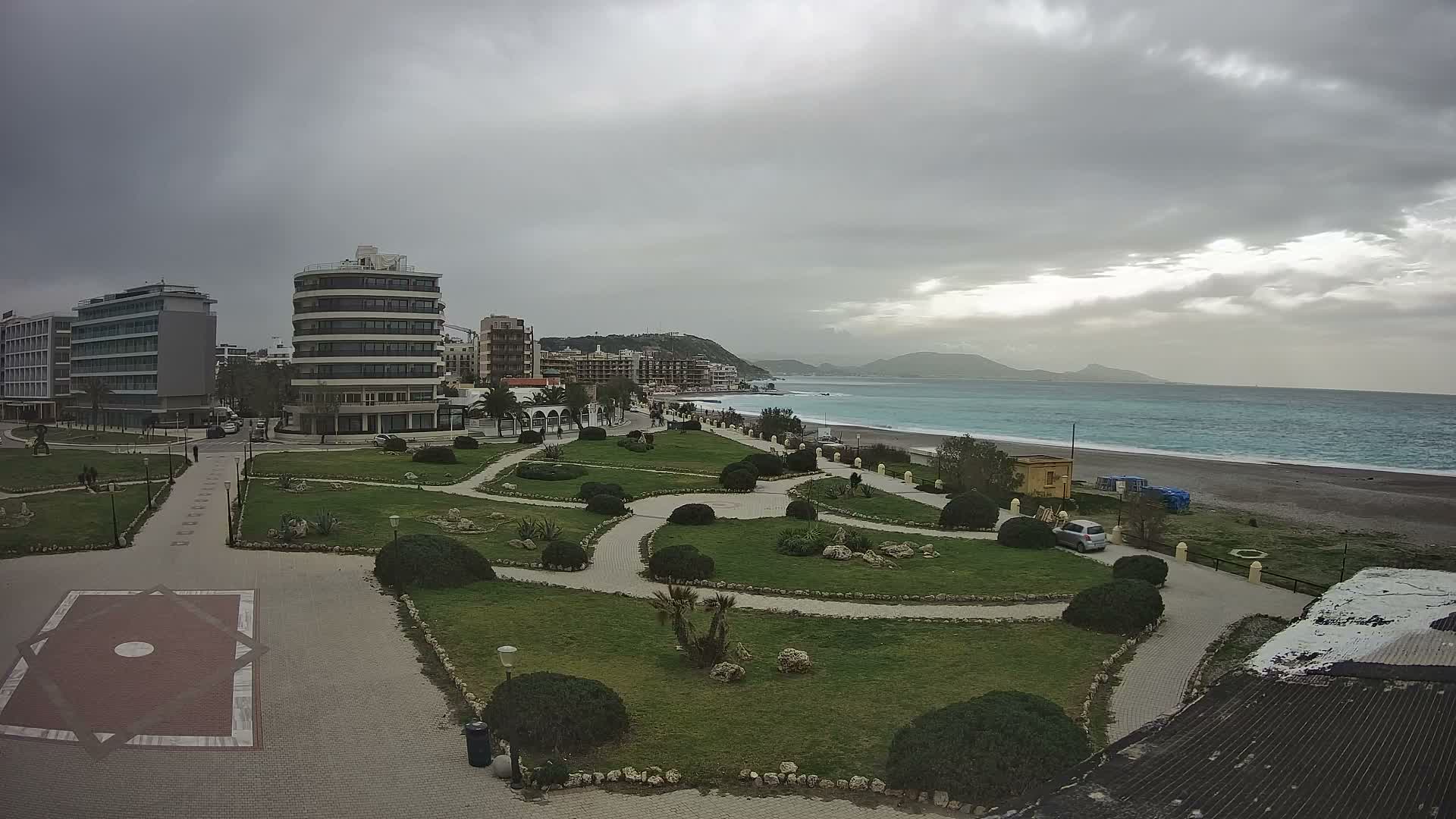 Rhodes, Paralia Elli Beach & Platia Enidriou Plaza Live Cam - Elli Beach, Rhodes (Ródos), Dodacanese, South Aegean (Periféreia Notíou Aigaíou), Greece