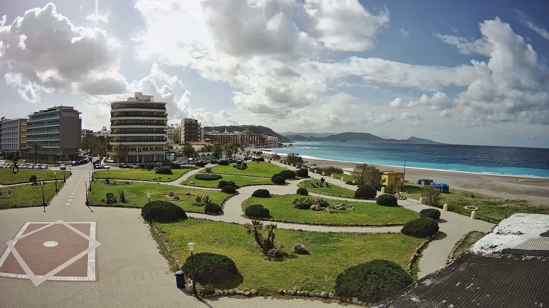 Rhodes, Paralia Elli Beach & Platia Enidriou Plaza Live Cam - Elli Beach, Rhodes (Ródos), Dodacanese, South Aegean (Periféreia Notíou Aigaíou), Greece
