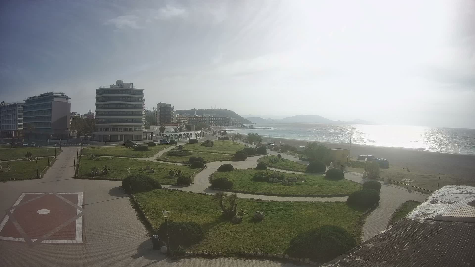 Rhodes, Paralia Elli Beach & Platia Enidriou Plaza Live Cam - Elli Beach, Rhodes (Ródos), Dodacanese, South Aegean (Periféreia Notíou Aigaíou), Greece