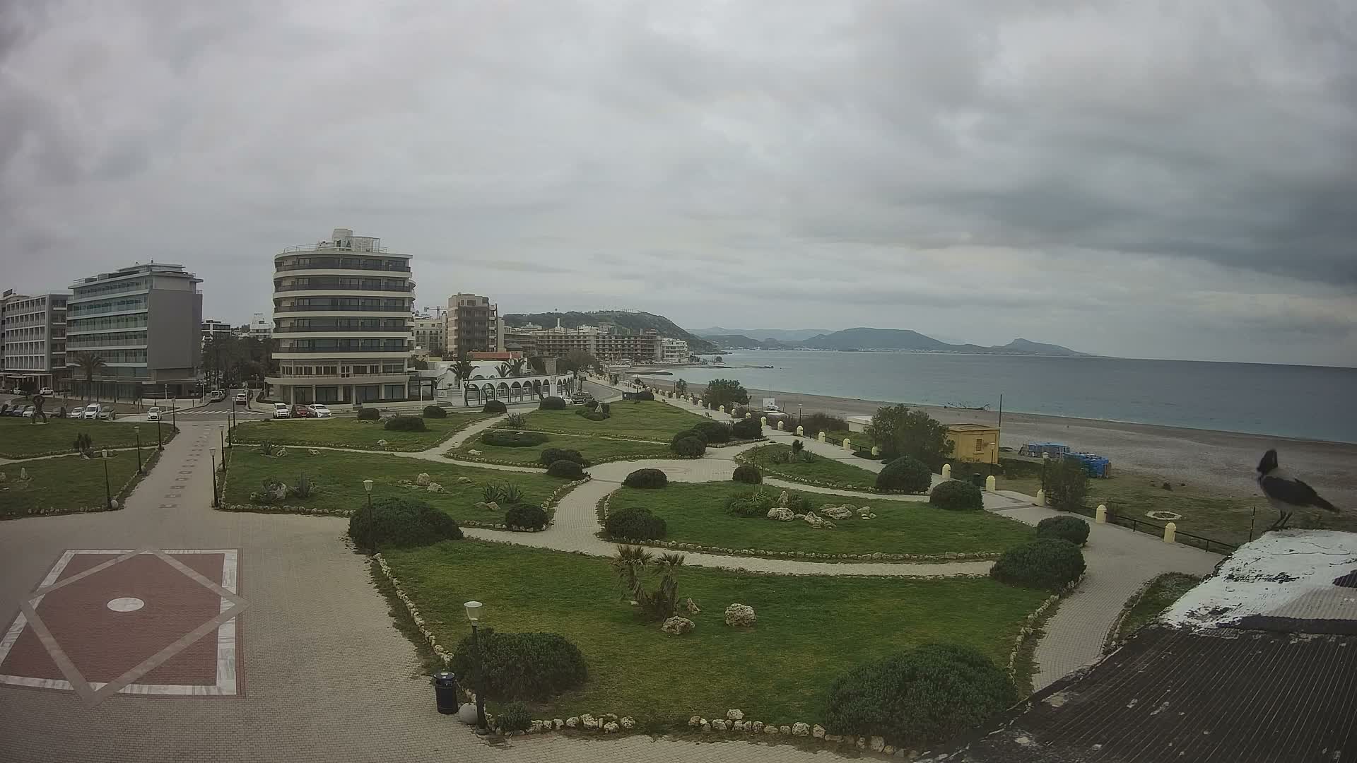 Rhodes, Paralia Elli Beach & Platia Enidriou Plaza Live Cam - Elli Beach, Rhodes (Ródos), Dodacanese, South Aegean (Periféreia Notíou Aigaíou), Greece