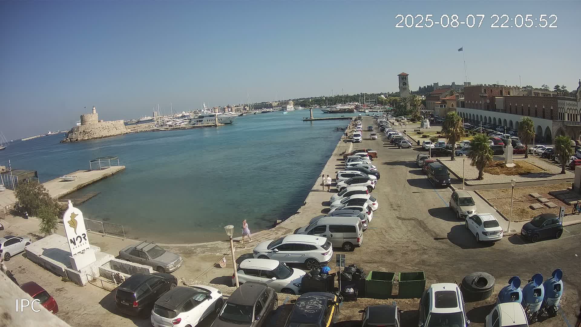 Rhodes, Colossus of Rhodes (Kolossos tis Ródou)- Mandraki Rhodes Marina & Platia Antinavarchou Perikli Ioannidi Plaza Live Cam - Rhodes (Ródos), Dodacanese, South Aegean (Periféreia Notíou Aigaíou), Greece 