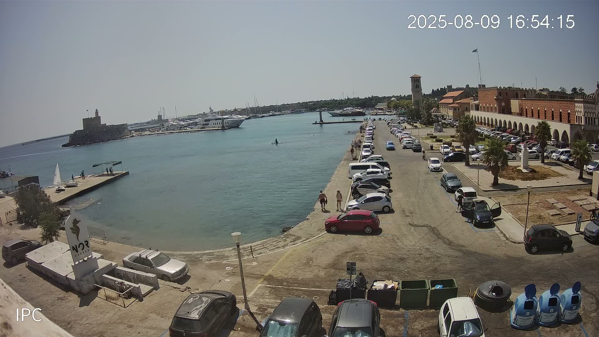 Rhodes, Colossus of Rhodes (Kolossos tis Ródou)- Mandraki Rhodes Marina & Platia Antinavarchou Perikli Ioannidi Plaza Live Cam - Rhodes (Ródos), Dodacanese, South Aegean (Periféreia Notíou Aigaíou), Greece 