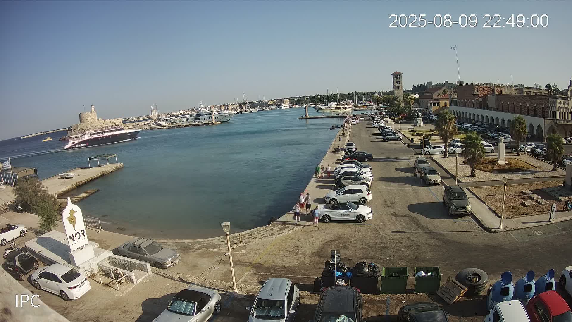 Rhodes, Colossus of Rhodes (Kolossos tis Ródou)- Mandraki Rhodes Marina & Platia Antinavarchou Perikli Ioannidi Plaza Live Cam - Rhodes (Ródos), Dodacanese, South Aegean (Periféreia Notíou Aigaíou), Greece 