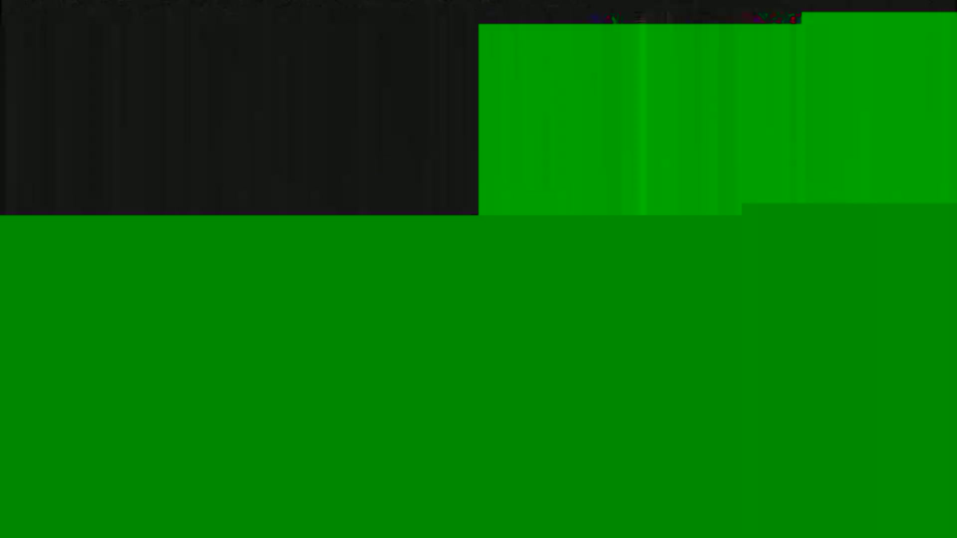 The image shows a mostly green screen with a smaller section of dark gray or black at the top.
