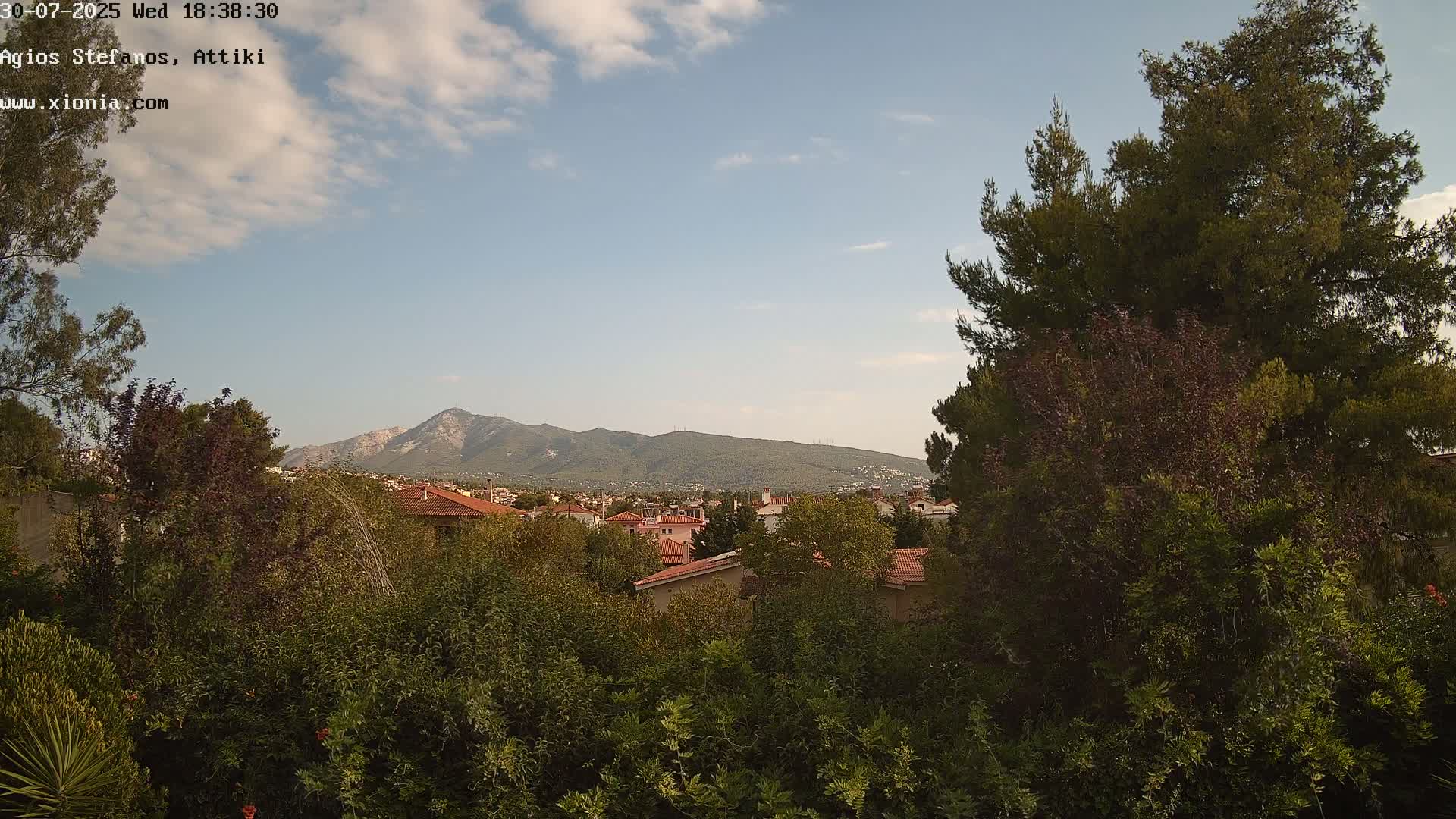 Dionysos, Agios Stefanos Skyline & Mount Pentelicus (Pentéli Óros) Live Cam  - Dasos Kouremenou, Ágios Stéfanos, Diónysos, East Attica (Anatolikís Attikís) , Athens (Athína), Attica (Attikí), Greece