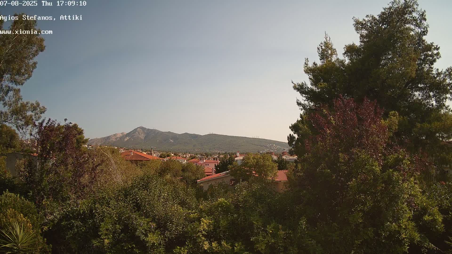 Dionysos, Agios Stefanos Skyline & Mount Pentelicus (Pentéli Óros) Live Cam  - Dasos Kouremenou, Ágios Stéfanos, Diónysos, East Attica (Anatolikís Attikís) , Athens (Athína), Attica (Attikí), Greece