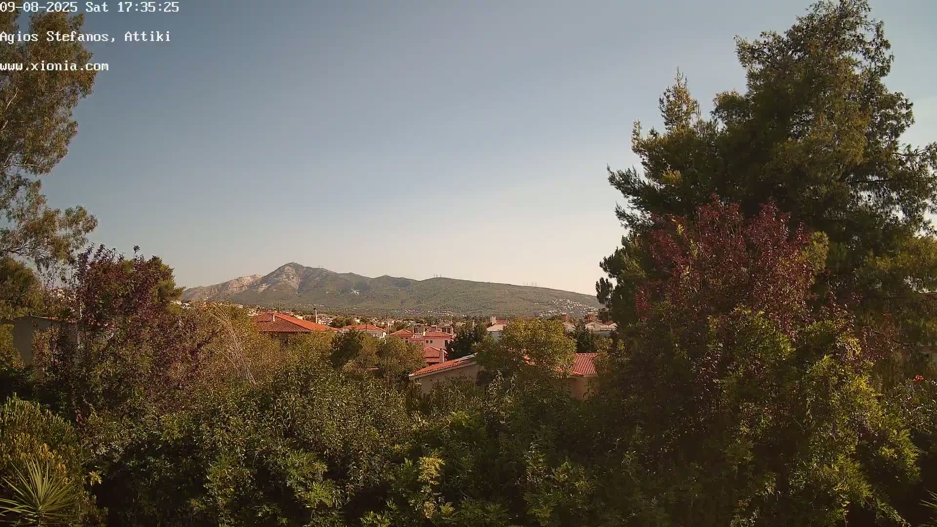 Dionysos, Agios Stefanos Skyline & Mount Pentelicus (Pentéli Óros) Live Cam  - Dasos Kouremenou, Ágios Stéfanos, Diónysos, East Attica (Anatolikís Attikís) , Athens (Athína), Attica (Attikí), Greece