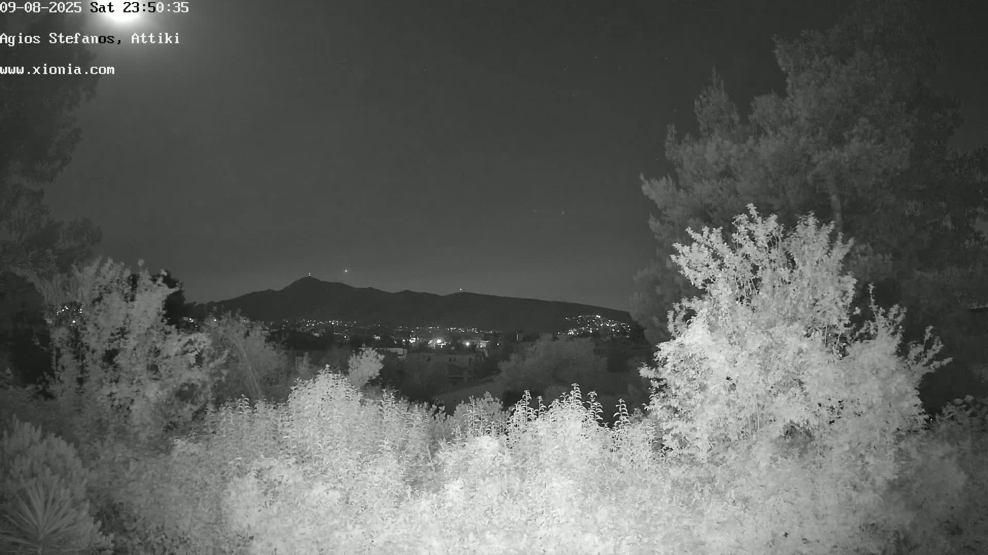 Dionysos, Agios Stefanos Skyline & Mount Pentelicus (Pentéli Óros) Live Cam  - Dasos Kouremenou, Ágios Stéfanos, Diónysos, East Attica (Anatolikís Attikís) , Athens (Athína), Attica (Attikí), Greece