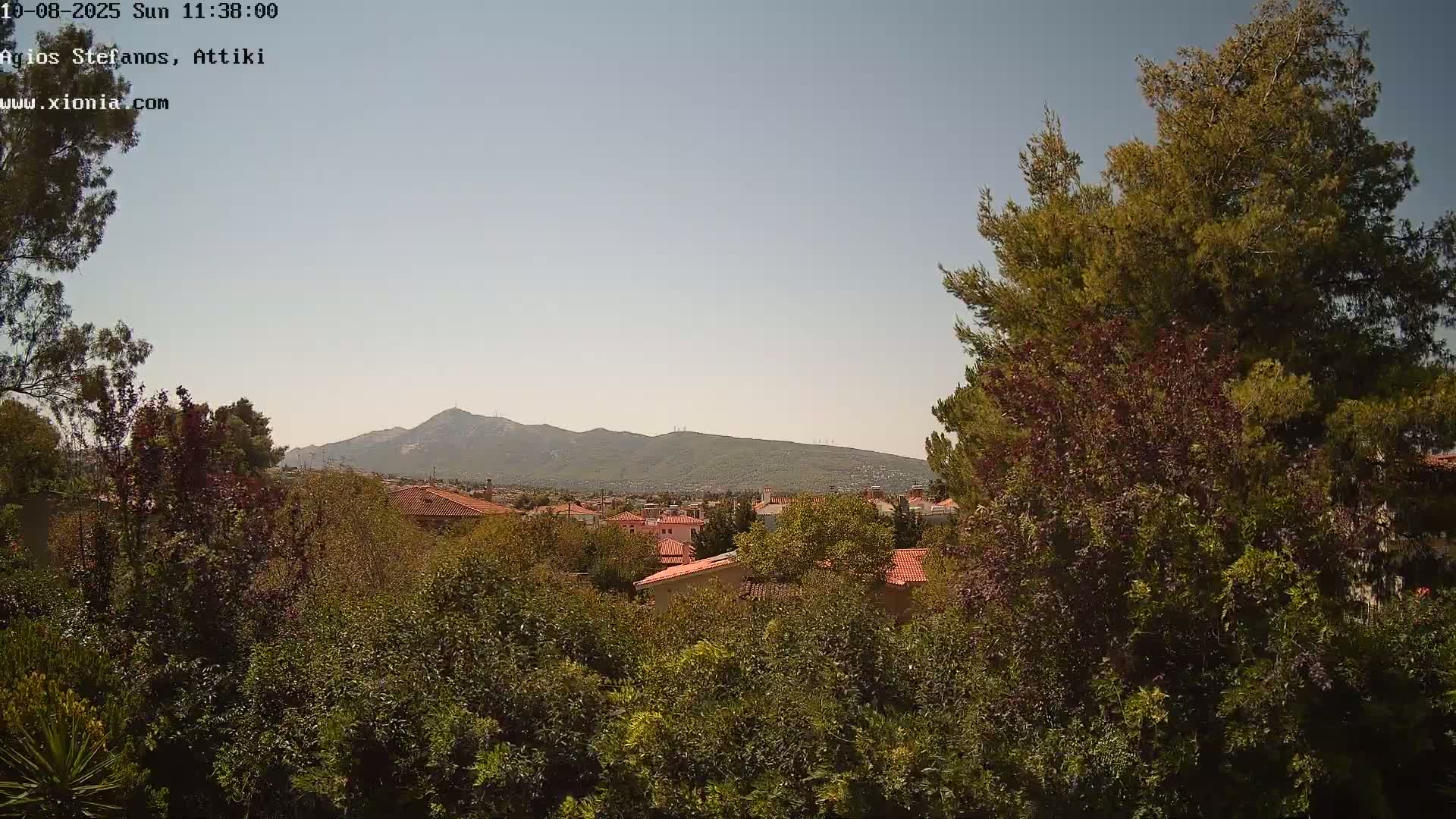 Dionysos, Agios Stefanos Skyline & Mount Pentelicus (Pentéli Óros) Live Cam  - Dasos Kouremenou, Ágios Stéfanos, Diónysos, East Attica (Anatolikís Attikís) , Athens (Athína), Attica (Attikí), Greece