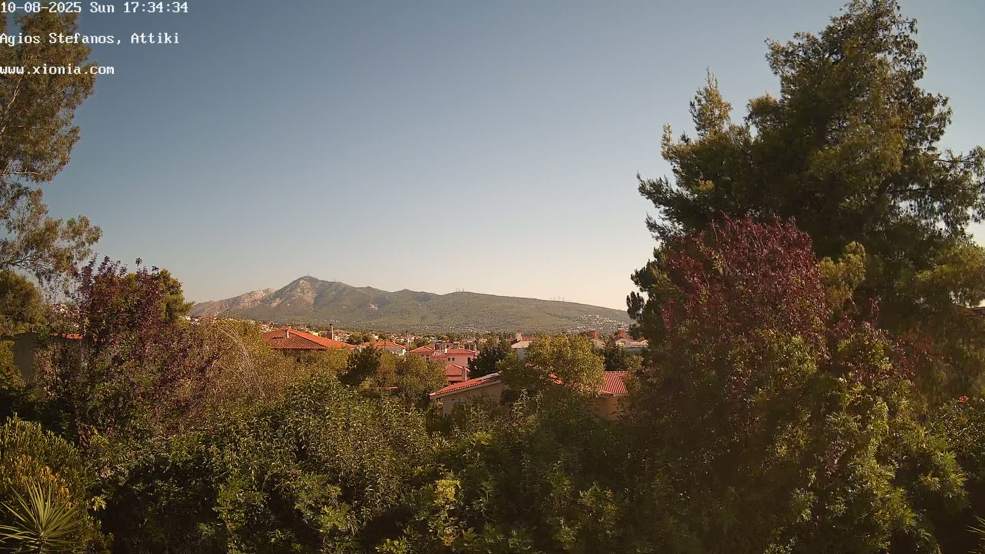 Dionysos, Agios Stefanos Skyline & Mount Pentelicus (Pentéli Óros) Live Cam  - Dasos Kouremenou, Ágios Stéfanos, Diónysos, East Attica (Anatolikís Attikís) , Athens (Athína), Attica (Attikí), Greece