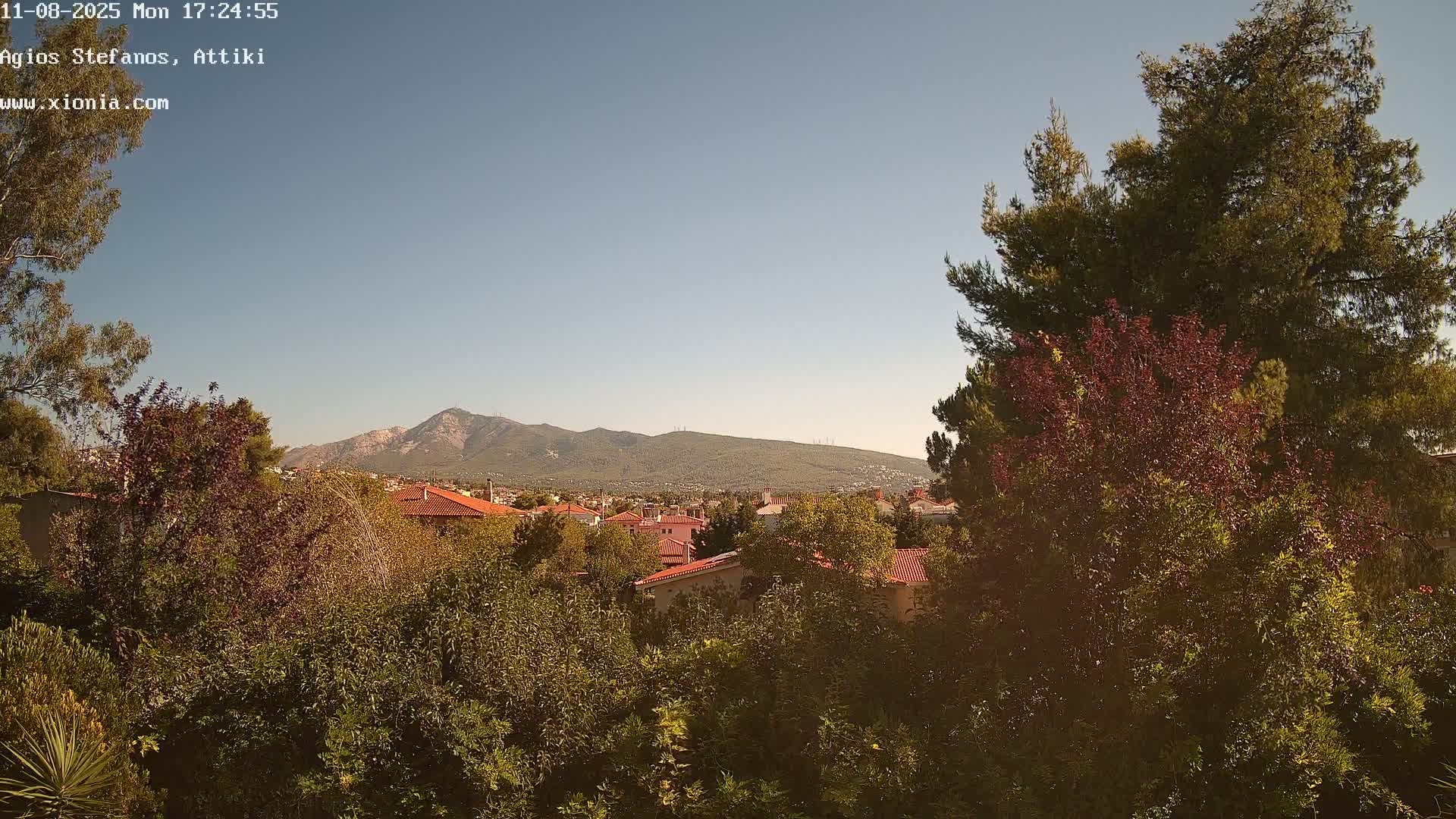 Dionysos, Agios Stefanos Skyline & Mount Pentelicus (Pentéli Óros) Live Cam  - Dasos Kouremenou, Ágios Stéfanos, Diónysos, East Attica (Anatolikís Attikís) , Athens (Athína), Attica (Attikí), Greece
