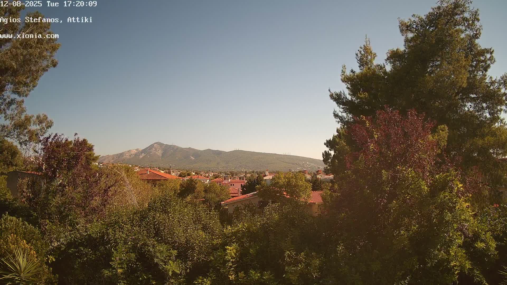 Dionysos, Agios Stefanos Skyline & Mount Pentelicus (Pentéli Óros) Live Cam  - Dasos Kouremenou, Ágios Stéfanos, Diónysos, East Attica (Anatolikís Attikís) , Athens (Athína), Attica (Attikí), Greece