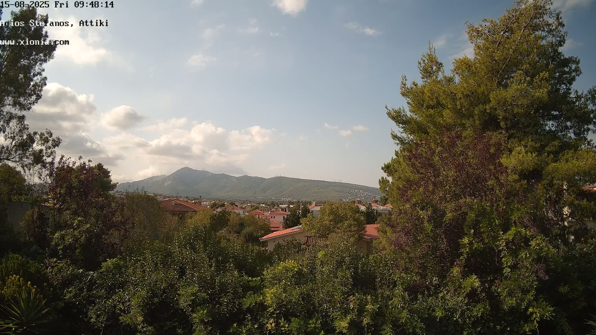 Dionysos, Agios Stefanos Skyline & Mount Pentelicus (Pentéli Óros) Live Cam  - Dasos Kouremenou, Ágios Stéfanos, Diónysos, East Attica (Anatolikís Attikís) , Athens (Athína), Attica (Attikí), Greece