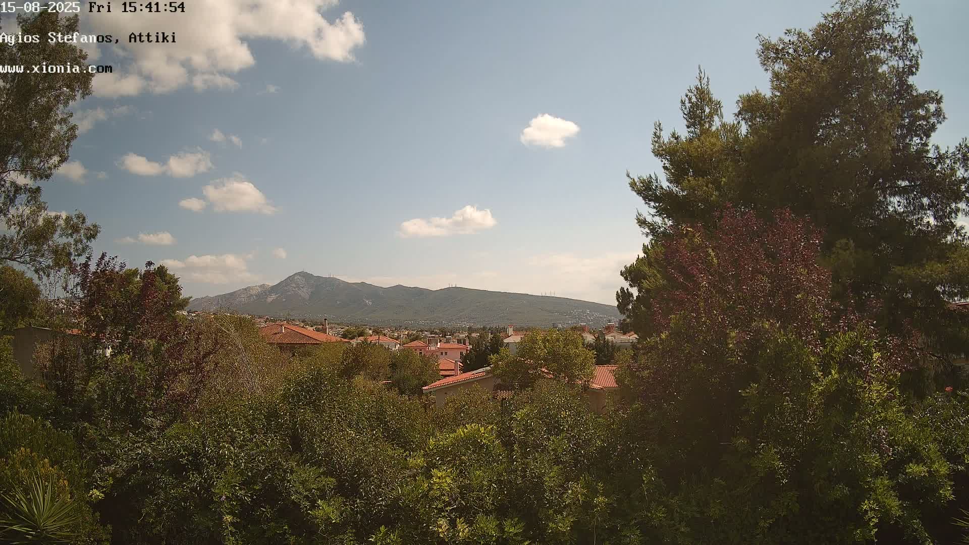 Dionysos, Agios Stefanos Skyline & Mount Pentelicus (Pentéli Óros) Live Cam  - Dasos Kouremenou, Ágios Stéfanos, Diónysos, East Attica (Anatolikís Attikís) , Athens (Athína), Attica (Attikí), Greece