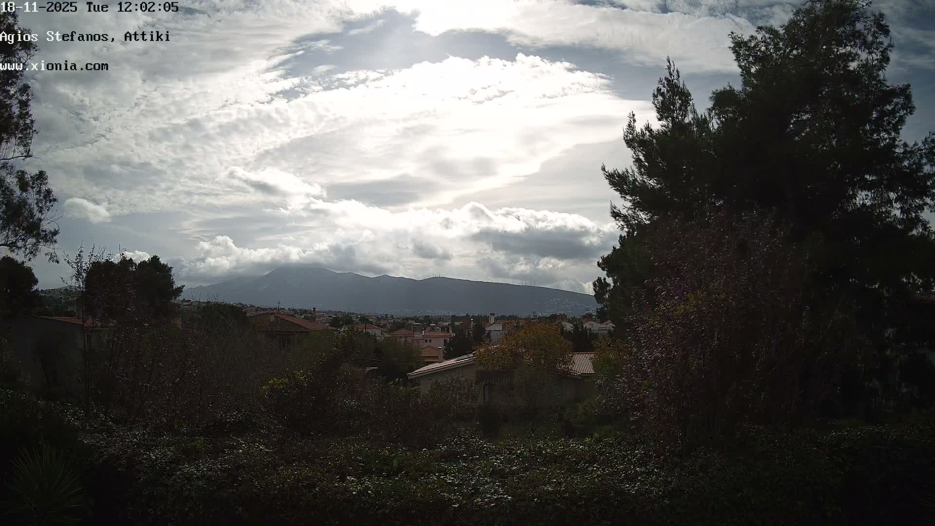 Dionysos, Agios Stefanos Skyline & Mount Pentelicus (Pentéli Óros) Live Cam  - Dasos Kouremenou, Ágios Stéfanos, Diónysos, East Attica (Anatolikís Attikís) , Athens (Athína), Attica (Attikí), Greece