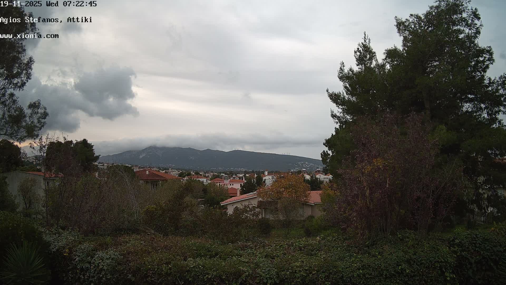 Dionysos, Agios Stefanos Skyline & Mount Pentelicus (Pentéli Óros) Live Cam  - Dasos Kouremenou, Ágios Stéfanos, Diónysos, East Attica (Anatolikís Attikís) , Athens (Athína), Attica (Attikí), Greece