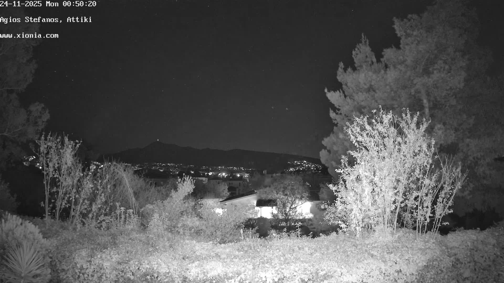 Dionysos, Agios Stefanos Skyline & Mount Pentelicus (Pentéli Óros) Live Cam  - Dasos Kouremenou, Ágios Stéfanos, Diónysos, East Attica (Anatolikís Attikís) , Athens (Athína), Attica (Attikí), Greece