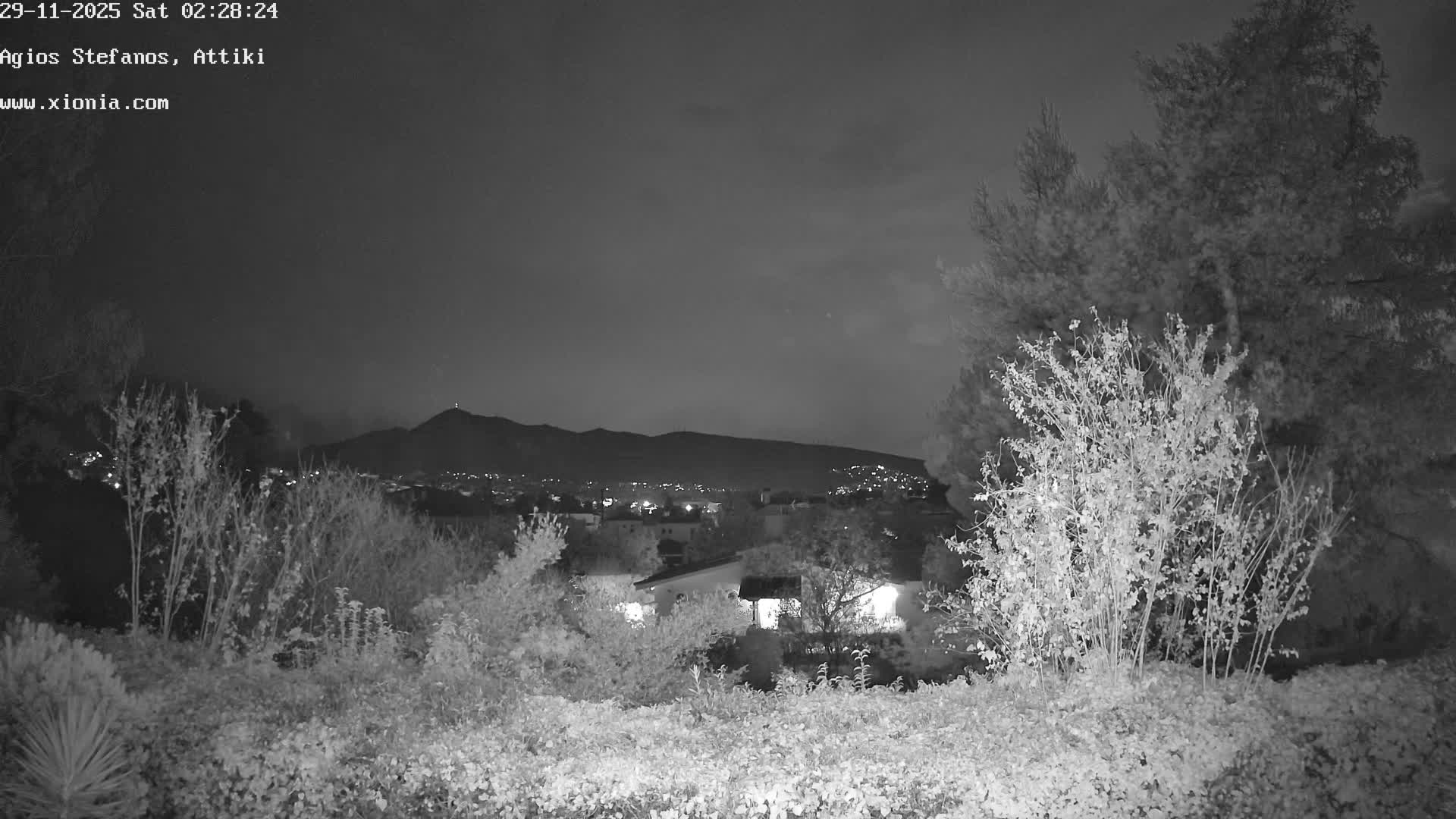 Dionysos, Agios Stefanos Skyline & Mount Pentelicus (Pentéli Óros) Live Cam  - Dasos Kouremenou, Ágios Stéfanos, Diónysos, East Attica (Anatolikís Attikís) , Athens (Athína), Attica (Attikí), Greece