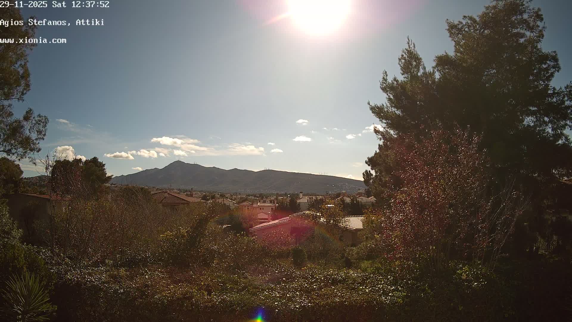 Dionysos, Agios Stefanos Skyline & Mount Pentelicus (Pentéli Óros) Live Cam  - Dasos Kouremenou, Ágios Stéfanos, Diónysos, East Attica (Anatolikís Attikís) , Athens (Athína), Attica (Attikí), Greece