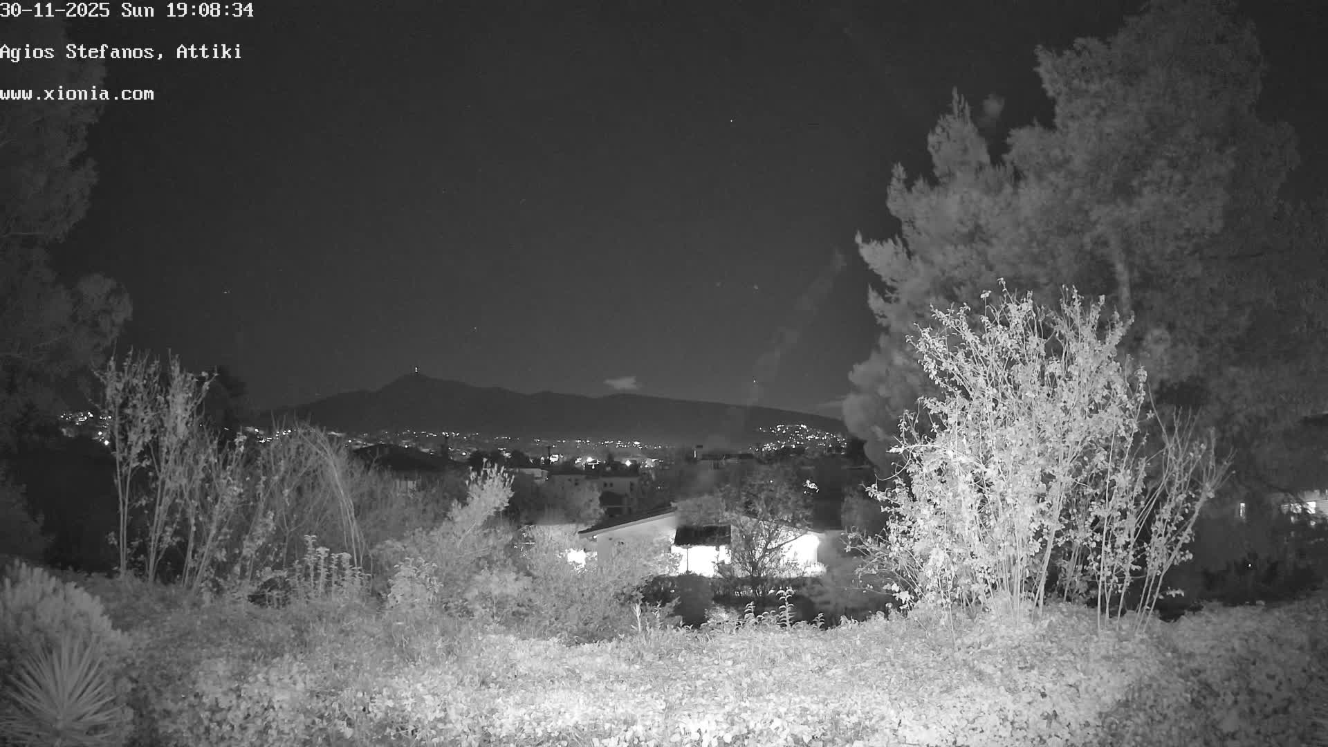 Dionysos, Agios Stefanos Skyline & Mount Pentelicus (Pentéli Óros) Live Cam  - Dasos Kouremenou, Ágios Stéfanos, Diónysos, East Attica (Anatolikís Attikís) , Athens (Athína), Attica (Attikí), Greece