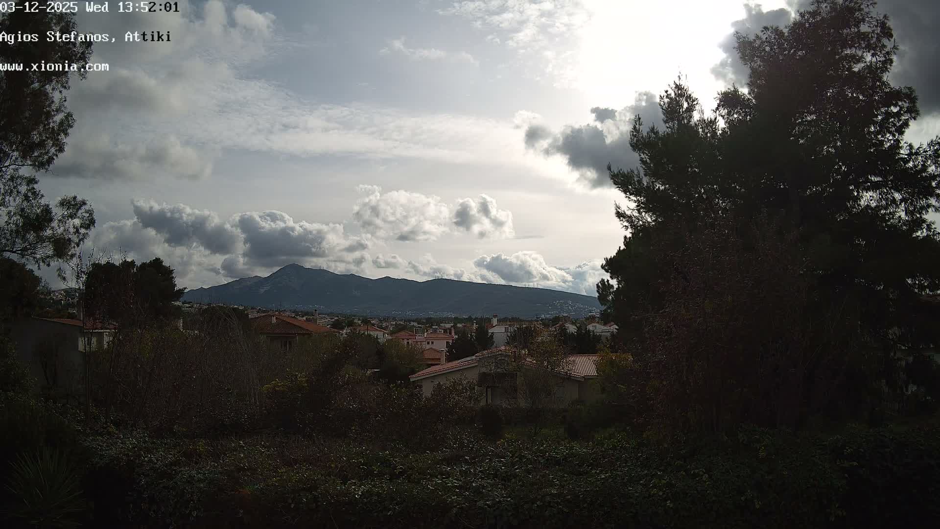 Dionysos, Agios Stefanos Skyline & Mount Pentelicus (Pentéli Óros) Live Cam  - Dasos Kouremenou, Ágios Stéfanos, Diónysos, East Attica (Anatolikís Attikís) , Athens (Athína), Attica (Attikí), Greece