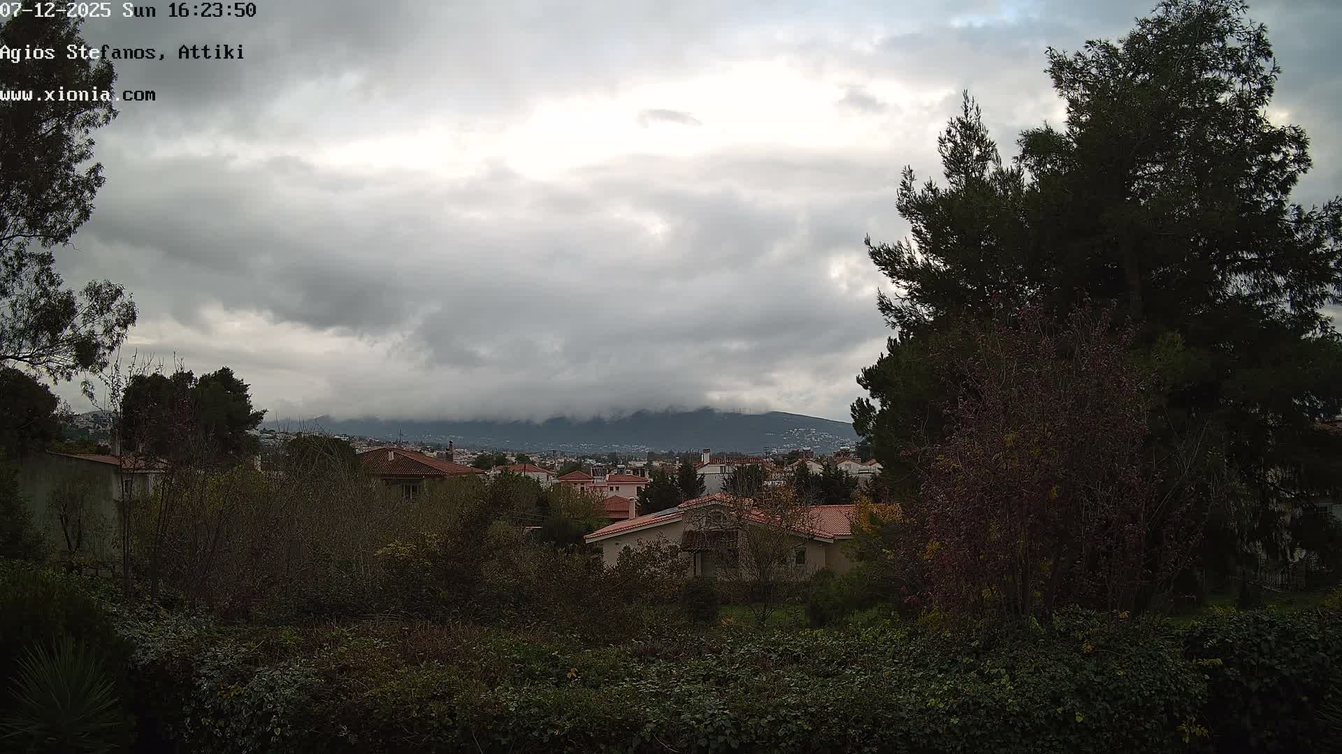 Dionysos, Agios Stefanos Skyline & Mount Pentelicus (Pentéli Óros) Live Cam  - Dasos Kouremenou, Ágios Stéfanos, Diónysos, East Attica (Anatolikís Attikís) , Athens (Athína), Attica (Attikí), Greece