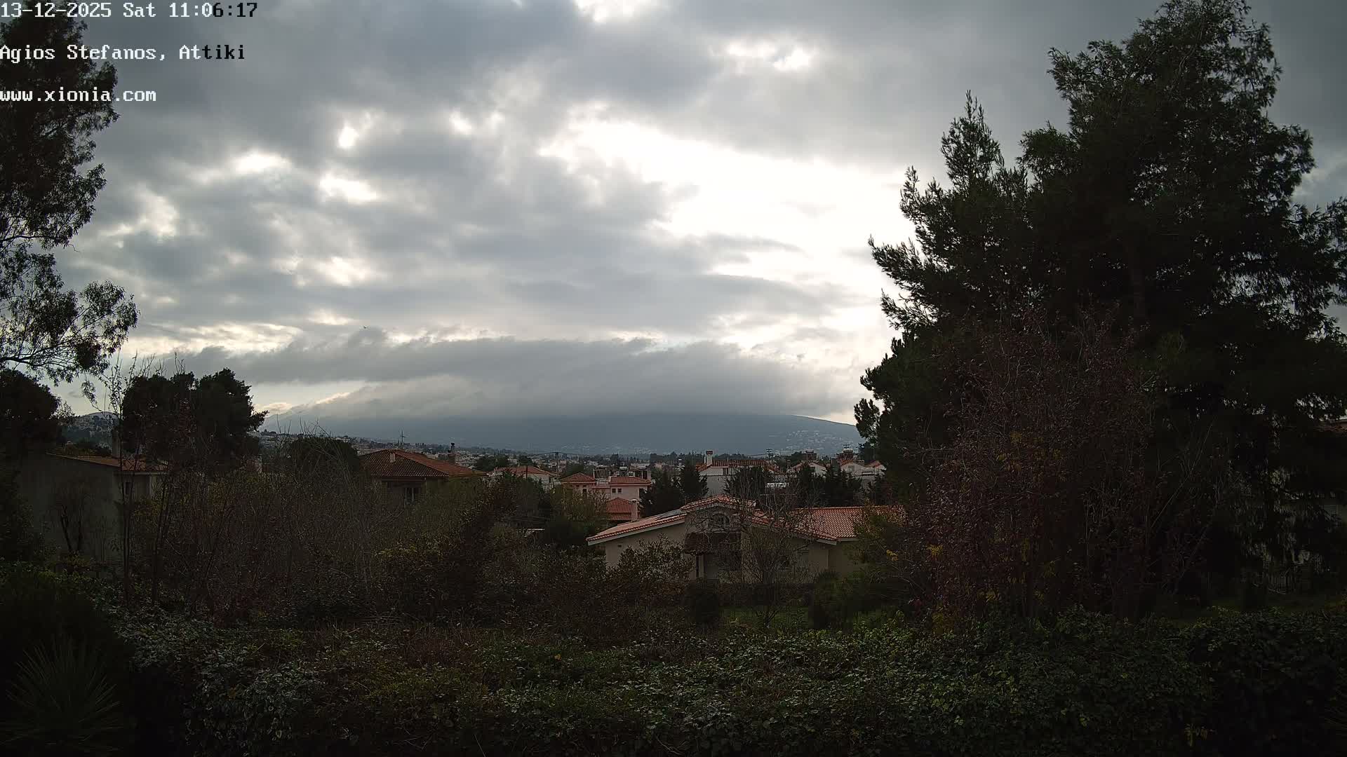 Dionysos, Agios Stefanos Skyline & Mount Pentelicus (Pentéli Óros) Live Cam  - Dasos Kouremenou, Ágios Stéfanos, Diónysos, East Attica (Anatolikís Attikís) , Athens (Athína), Attica (Attikí), Greece