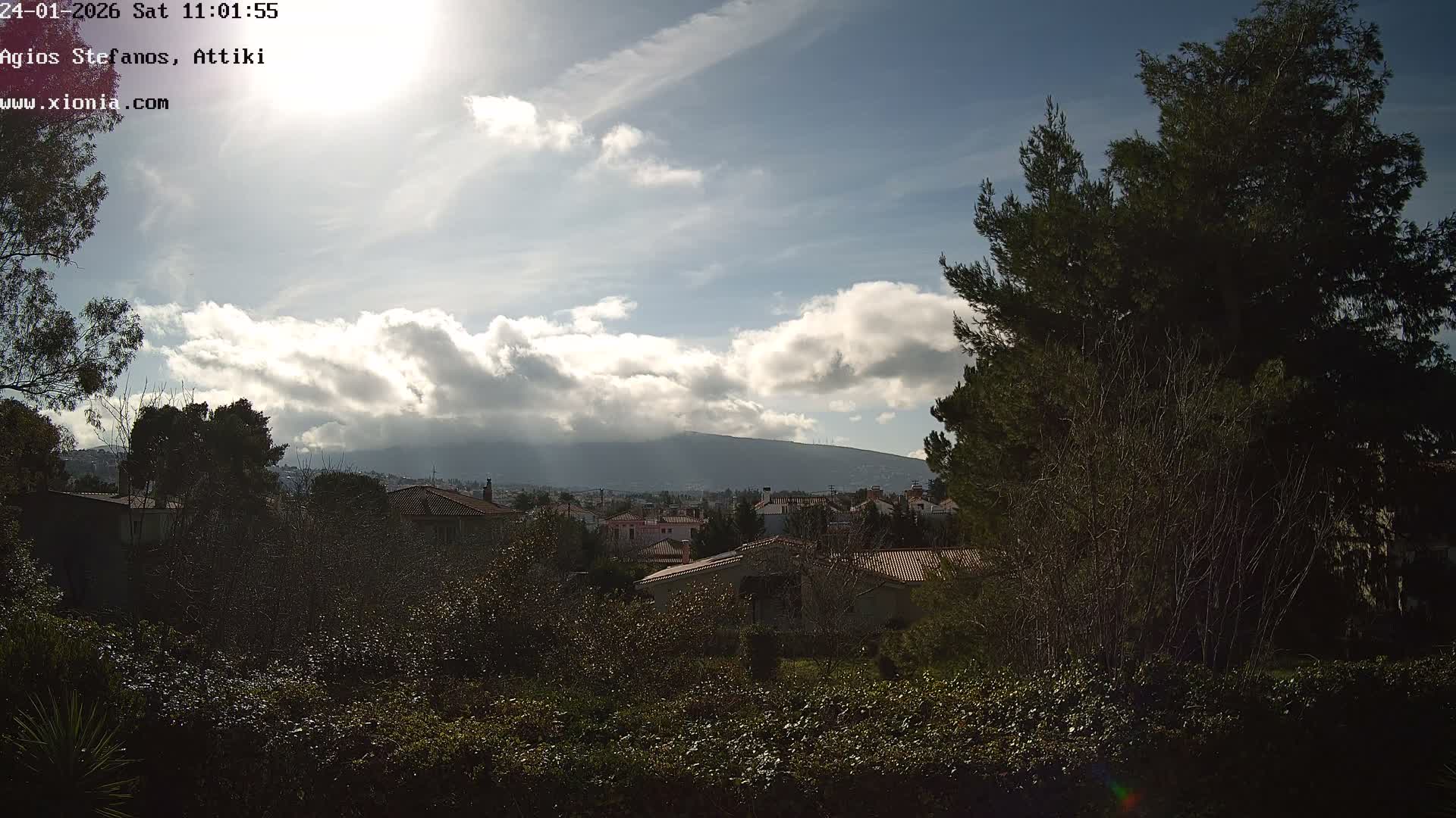 Dionysos, Agios Stefanos Skyline & Mount Pentelicus (Pentéli Óros) Live Cam  - Dasos Kouremenou, Ágios Stéfanos, Diónysos, East Attica (Anatolikís Attikís) , Athens (Athína), Attica (Attikí), Greece