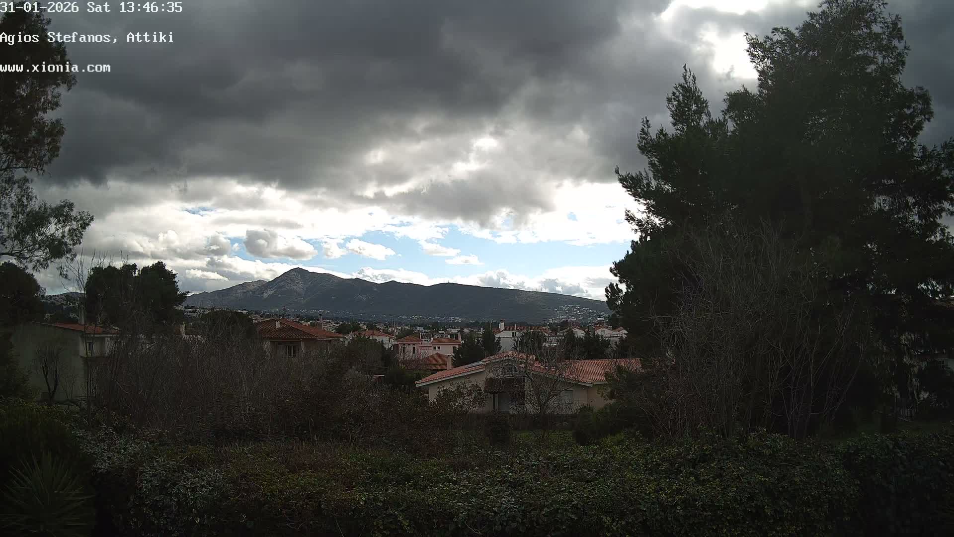 Dionysos, Agios Stefanos Skyline & Mount Pentelicus (Pentéli Óros) Live Cam  - Dasos Kouremenou, Ágios Stéfanos, Diónysos, East Attica (Anatolikís Attikís) , Athens (Athína), Attica (Attikí), Greece