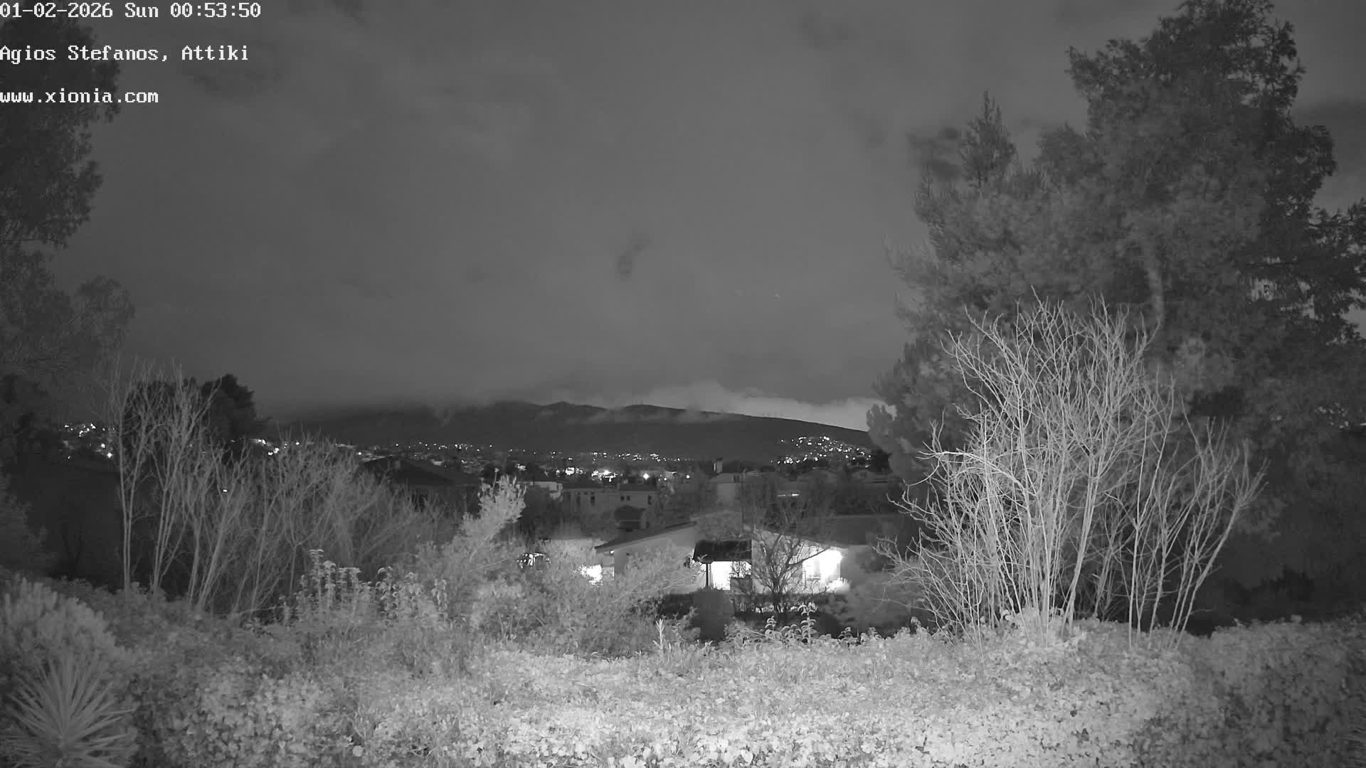 Dionysos, Agios Stefanos Skyline & Mount Pentelicus (Pentéli Óros) Live Cam  - Dasos Kouremenou, Ágios Stéfanos, Diónysos, East Attica (Anatolikís Attikís) , Athens (Athína), Attica (Attikí), Greece