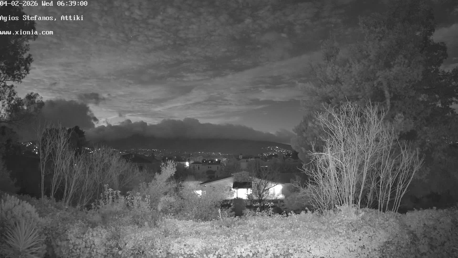 Dionysos, Agios Stefanos Skyline & Mount Pentelicus (Pentéli Óros) Live Cam  - Dasos Kouremenou, Ágios Stéfanos, Diónysos, East Attica (Anatolikís Attikís) , Athens (Athína), Attica (Attikí), Greece