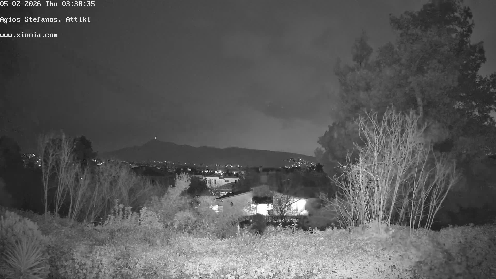 Dionysos, Agios Stefanos Skyline & Mount Pentelicus (Pentéli Óros) Live Cam  - Dasos Kouremenou, Ágios Stéfanos, Diónysos, East Attica (Anatolikís Attikís) , Athens (Athína), Attica (Attikí), Greece