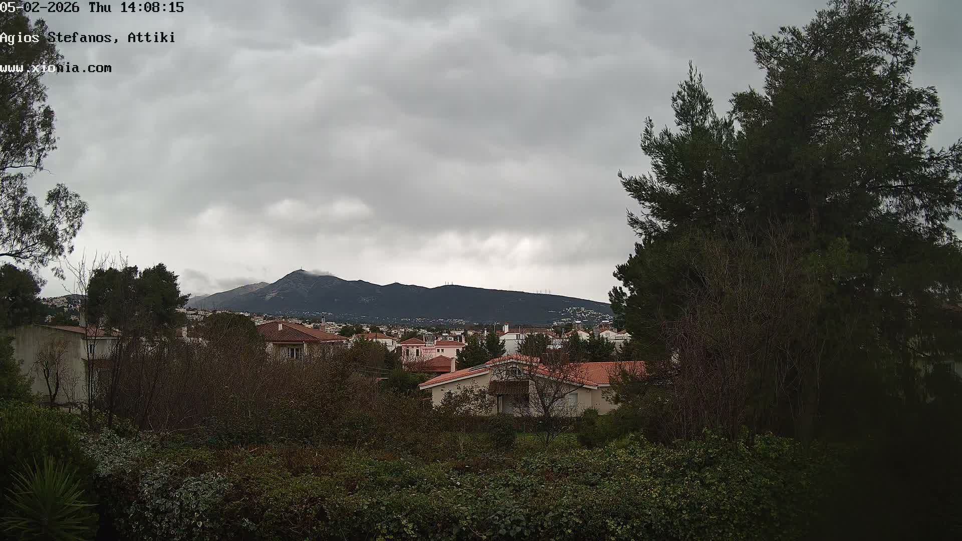 Dionysos, Agios Stefanos Skyline & Mount Pentelicus (Pentéli Óros) Live Cam  - Dasos Kouremenou, Ágios Stéfanos, Diónysos, East Attica (Anatolikís Attikís) , Athens (Athína), Attica (Attikí), Greece