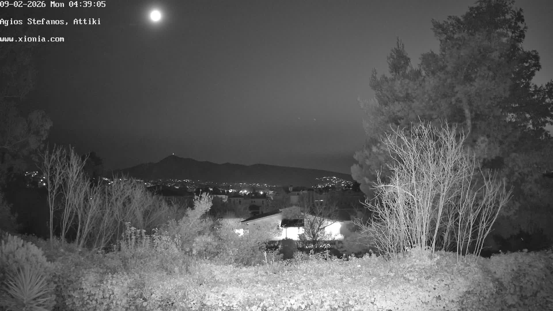 Dionysos, Agios Stefanos Skyline & Mount Pentelicus (Pentéli Óros) Live Cam  - Dasos Kouremenou, Ágios Stéfanos, Diónysos, East Attica (Anatolikís Attikís) , Athens (Athína), Attica (Attikí), Greece