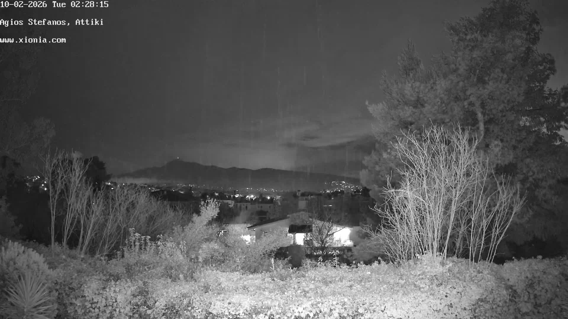 Dionysos, Agios Stefanos Skyline & Mount Pentelicus (Pentéli Óros) Live Cam  - Dasos Kouremenou, Ágios Stéfanos, Diónysos, East Attica (Anatolikís Attikís) , Athens (Athína), Attica (Attikí), Greece