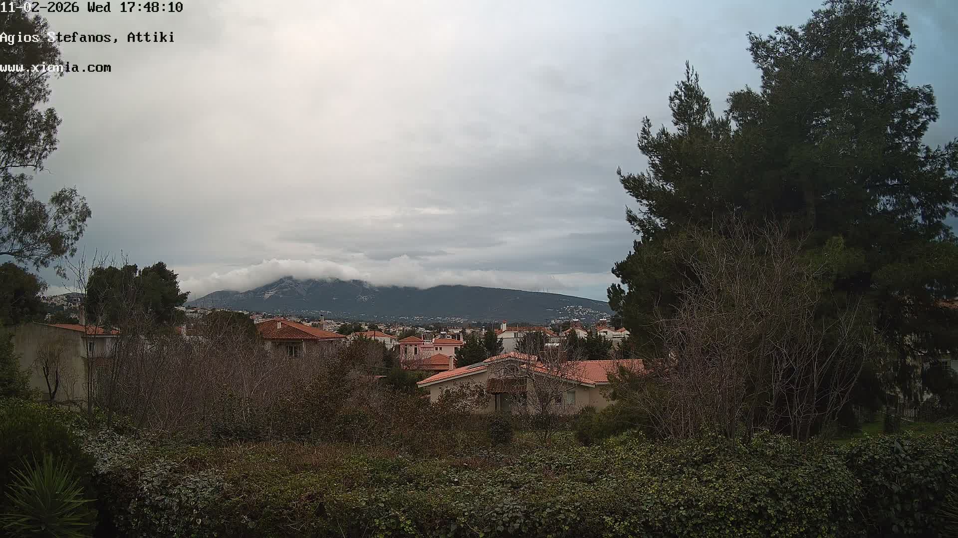Dionysos, Agios Stefanos Skyline & Mount Pentelicus (Pentéli Óros) Live Cam  - Dasos Kouremenou, Ágios Stéfanos, Diónysos, East Attica (Anatolikís Attikís) , Athens (Athína), Attica (Attikí), Greece
