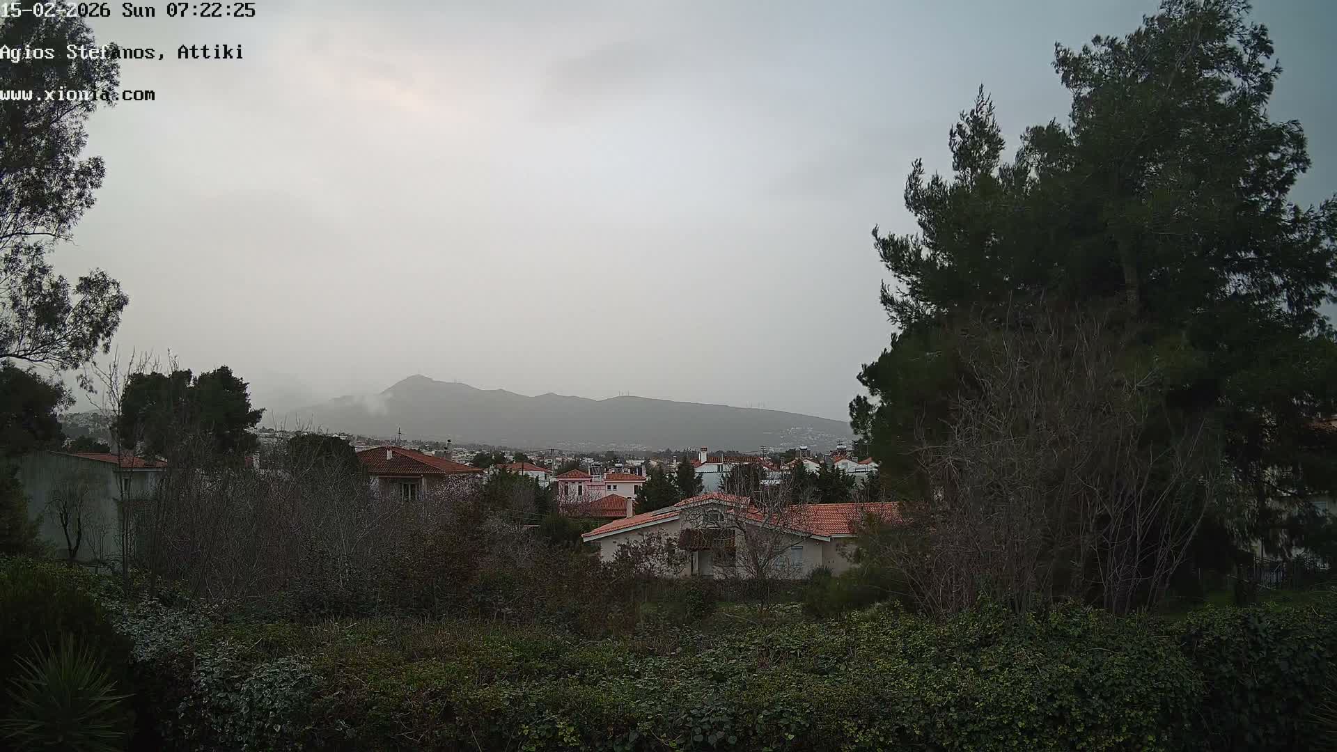 Dionysos, Agios Stefanos Skyline & Mount Pentelicus (Pentéli Óros) Live Cam  - Dasos Kouremenou, Ágios Stéfanos, Diónysos, East Attica (Anatolikís Attikís) , Athens (Athína), Attica (Attikí), Greece