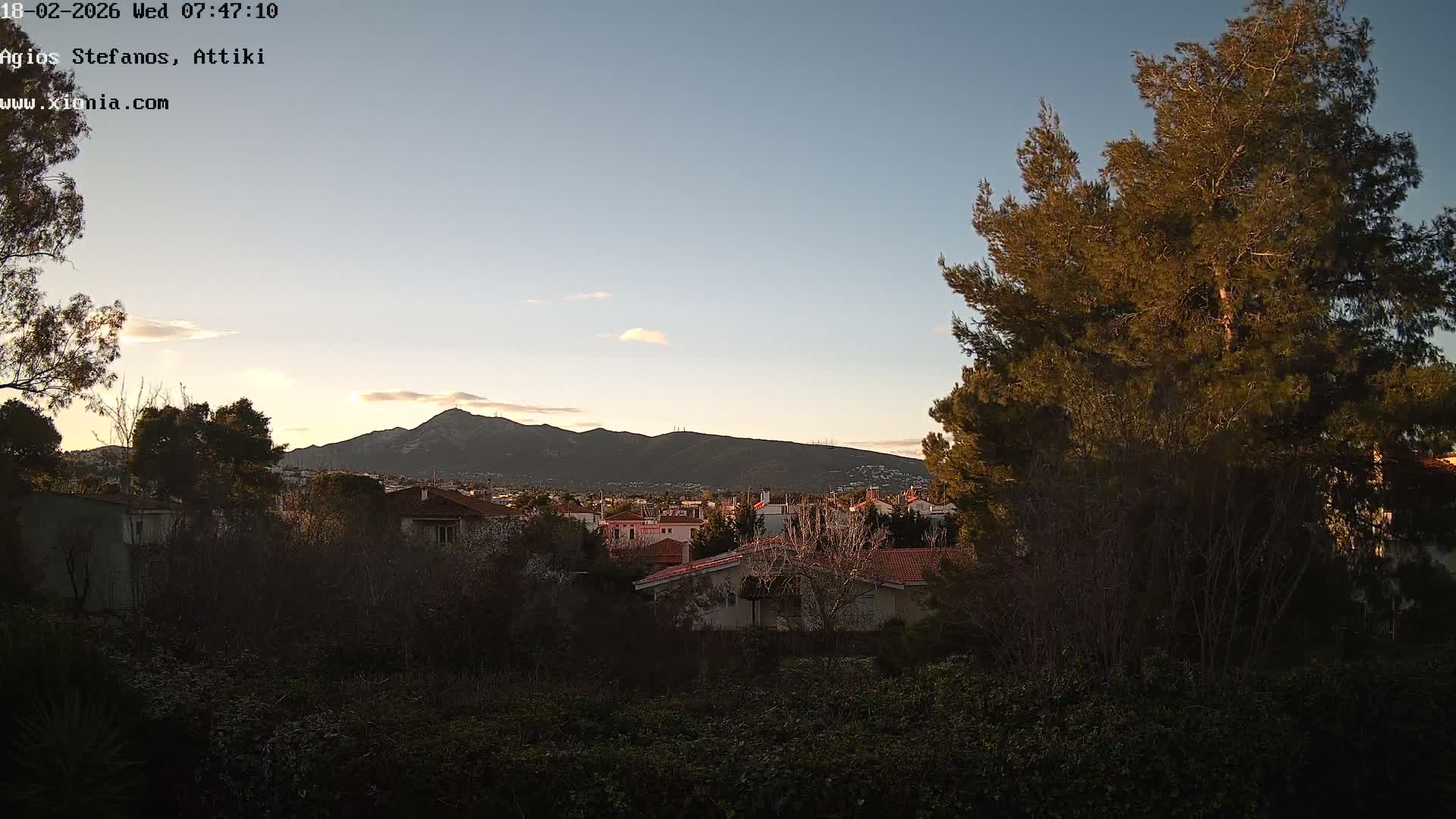Dionysos, Agios Stefanos Skyline & Mount Pentelicus (Pentéli Óros) Live Cam  - Dasos Kouremenou, Ágios Stéfanos, Diónysos, East Attica (Anatolikís Attikís) , Athens (Athína), Attica (Attikí), Greece
