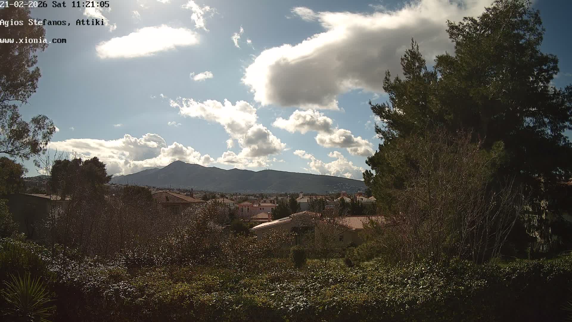 Dionysos, Agios Stefanos Skyline & Mount Pentelicus (Pentéli Óros) Live Cam  - Dasos Kouremenou, Ágios Stéfanos, Diónysos, East Attica (Anatolikís Attikís) , Athens (Athína), Attica (Attikí), Greece