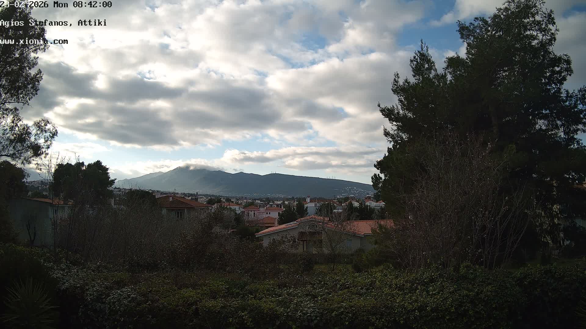 Dionysos, Agios Stefanos Skyline & Mount Pentelicus (Pentéli Óros) Live Cam  - Dasos Kouremenou, Ágios Stéfanos, Diónysos, East Attica (Anatolikís Attikís) , Athens (Athína), Attica (Attikí), Greece