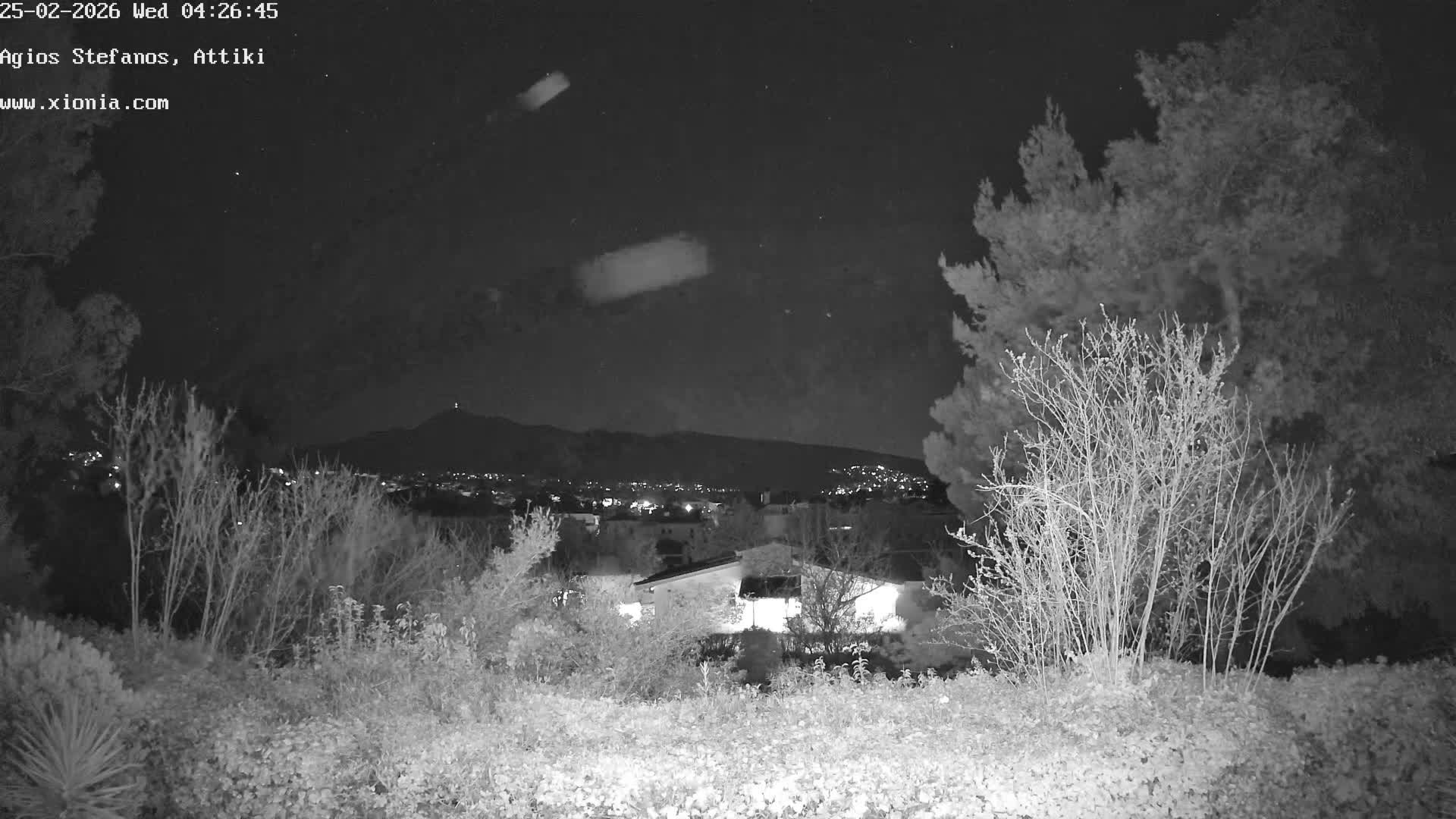Dionysos, Agios Stefanos Skyline & Mount Pentelicus (Pentéli Óros) Live Cam  - Dasos Kouremenou, Ágios Stéfanos, Diónysos, East Attica (Anatolikís Attikís) , Athens (Athína), Attica (Attikí), Greece