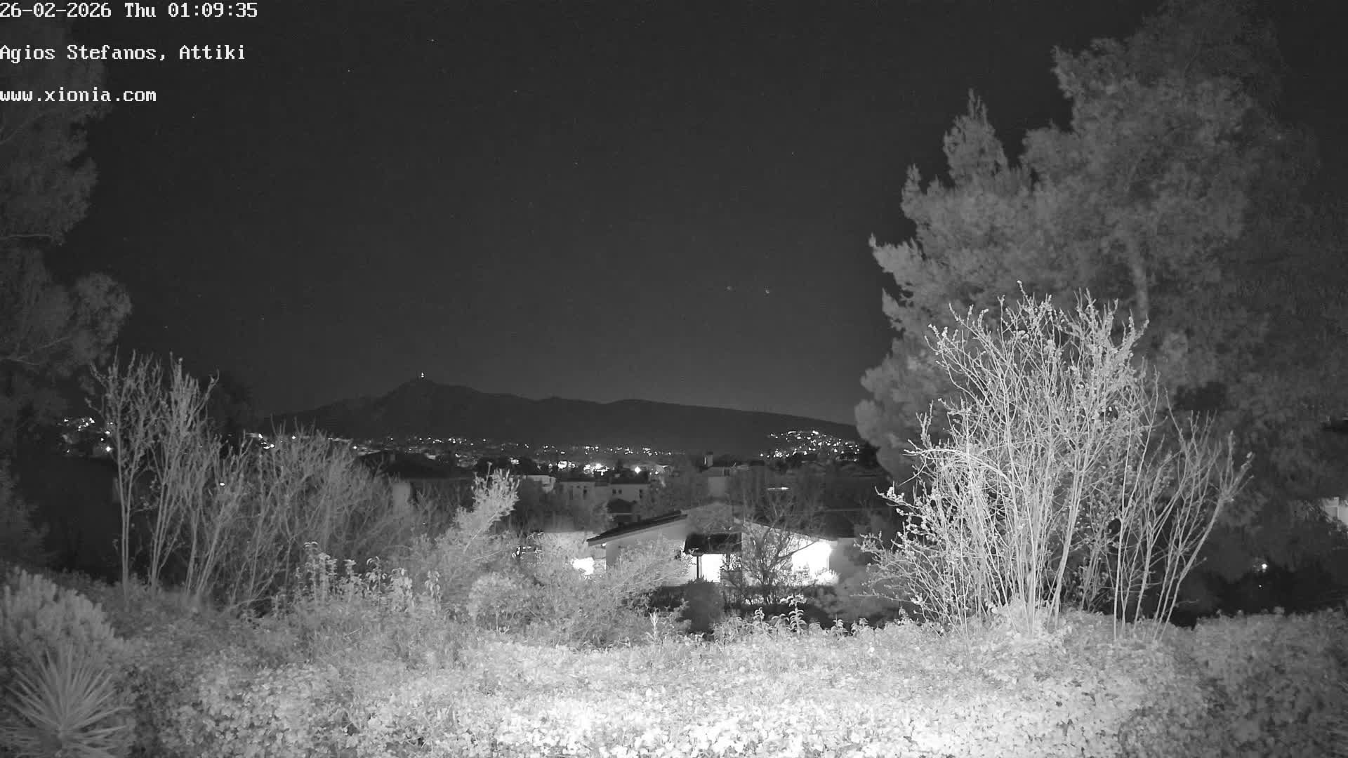 Dionysos, Agios Stefanos Skyline & Mount Pentelicus (Pentéli Óros) Live Cam  - Dasos Kouremenou, Ágios Stéfanos, Diónysos, East Attica (Anatolikís Attikís) , Athens (Athína), Attica (Attikí), Greece
